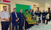 حضور کاروان حامل پرچم متبرک حرم امام رضا به مناسبت دهه ی مبارک کرامت در بیمارستان فاطمه الزهرا شهرستان حاجی آباد